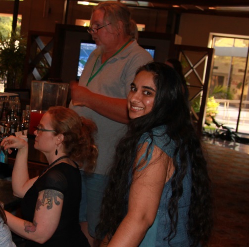 Author Amanda Downum, ArmadilloCon 2015 committee member Charlies Siros, and writers' workshop student Vidya at the Meet The Pros