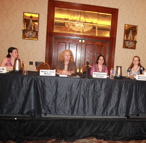 ArmadilloCon 2015 panel on the new feminist SF, right before the last panelist, Stina Leicht, arrived. Left to right: Caroline Yoachim, Nancy Jane Moore, Katherine Sanger, Amanda Downum.