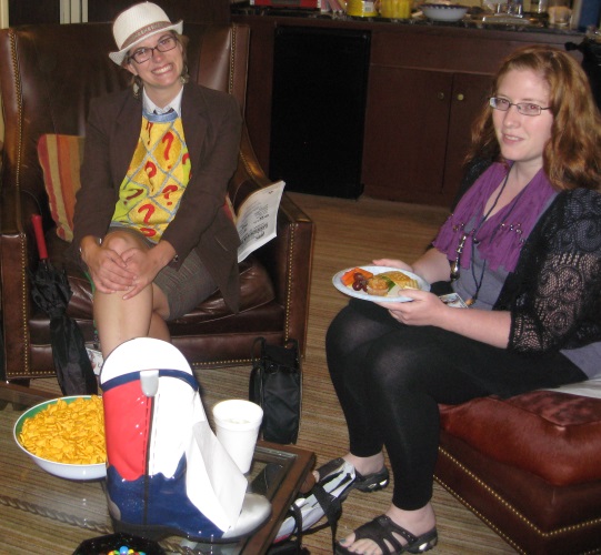 A woman dressed as the 7th Doctor, and Abby in the ArmadilloCon 2012 Consuite