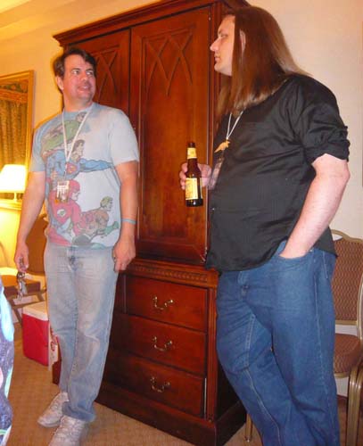 Writers A. Lee Martinez (left) and Scott Lynch at an ArmadilloCon 2009 room party.