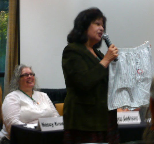 In one of the funniest ArmadilloCon toastmaster speeches in recent memory, Nancy Kress holds up a rather personal garment, allegedly belonging to editor Gardner Dozois, and speculated which famous author lipstick print was on it.